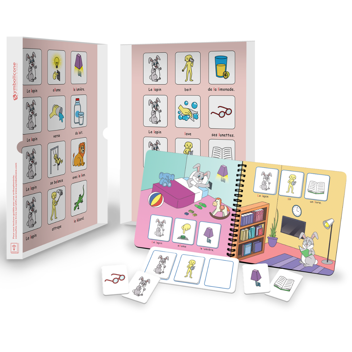 Boîte métallique ouverte d’un livre magnétique du coffret : livret en spirale et pièces