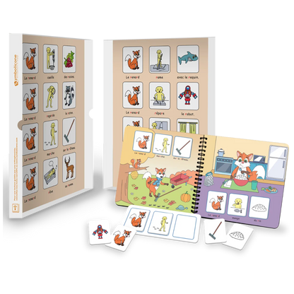 Boîte métallique ouverte d’un livre magnétique du coffret : livret en spirale et pièces